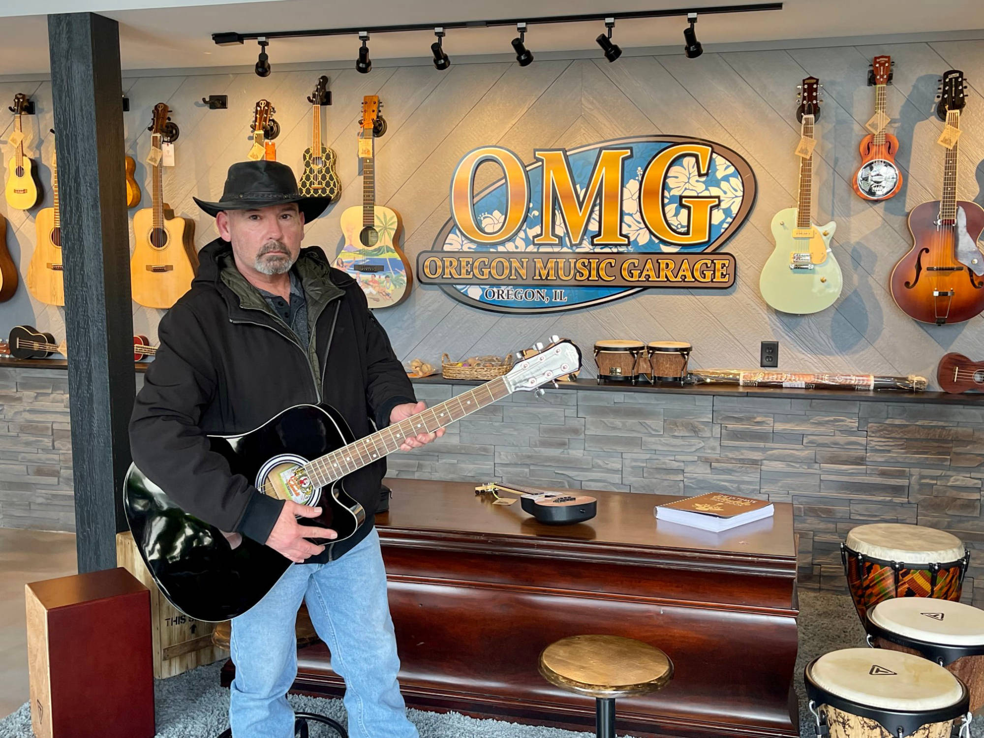 Mike with Oscar Schmidt by Washburn Guitar